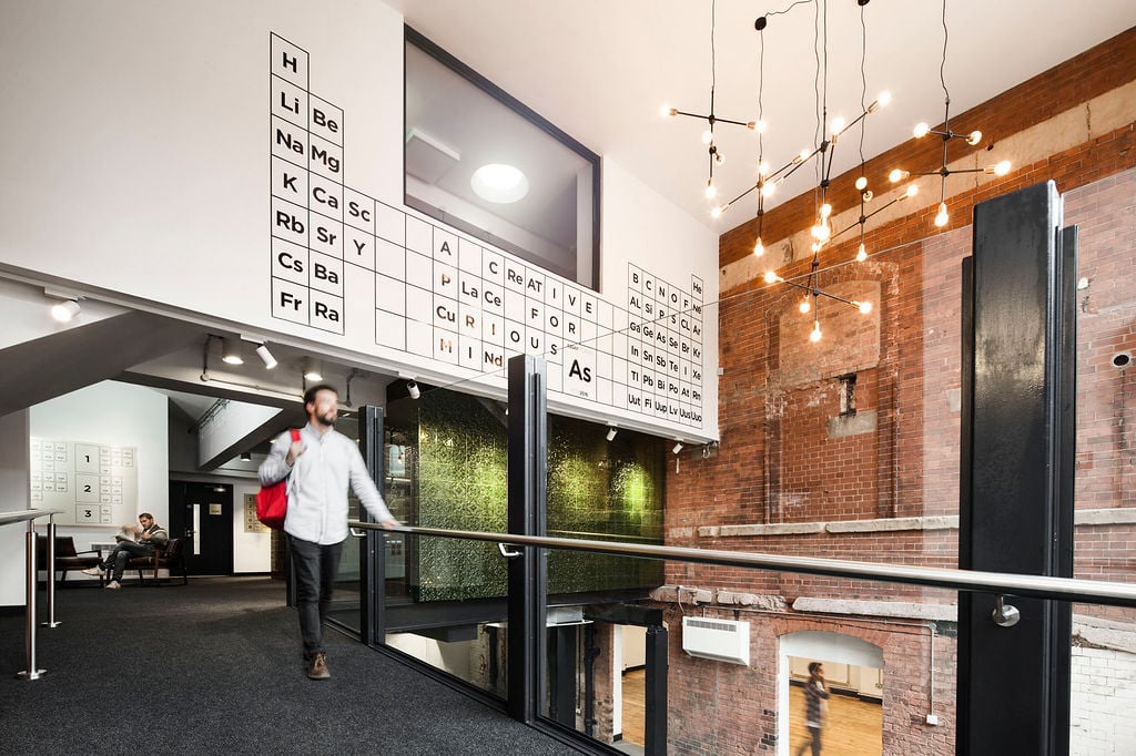 TCN Assay Studios Birmingham Main Entrance With Man Walking Past