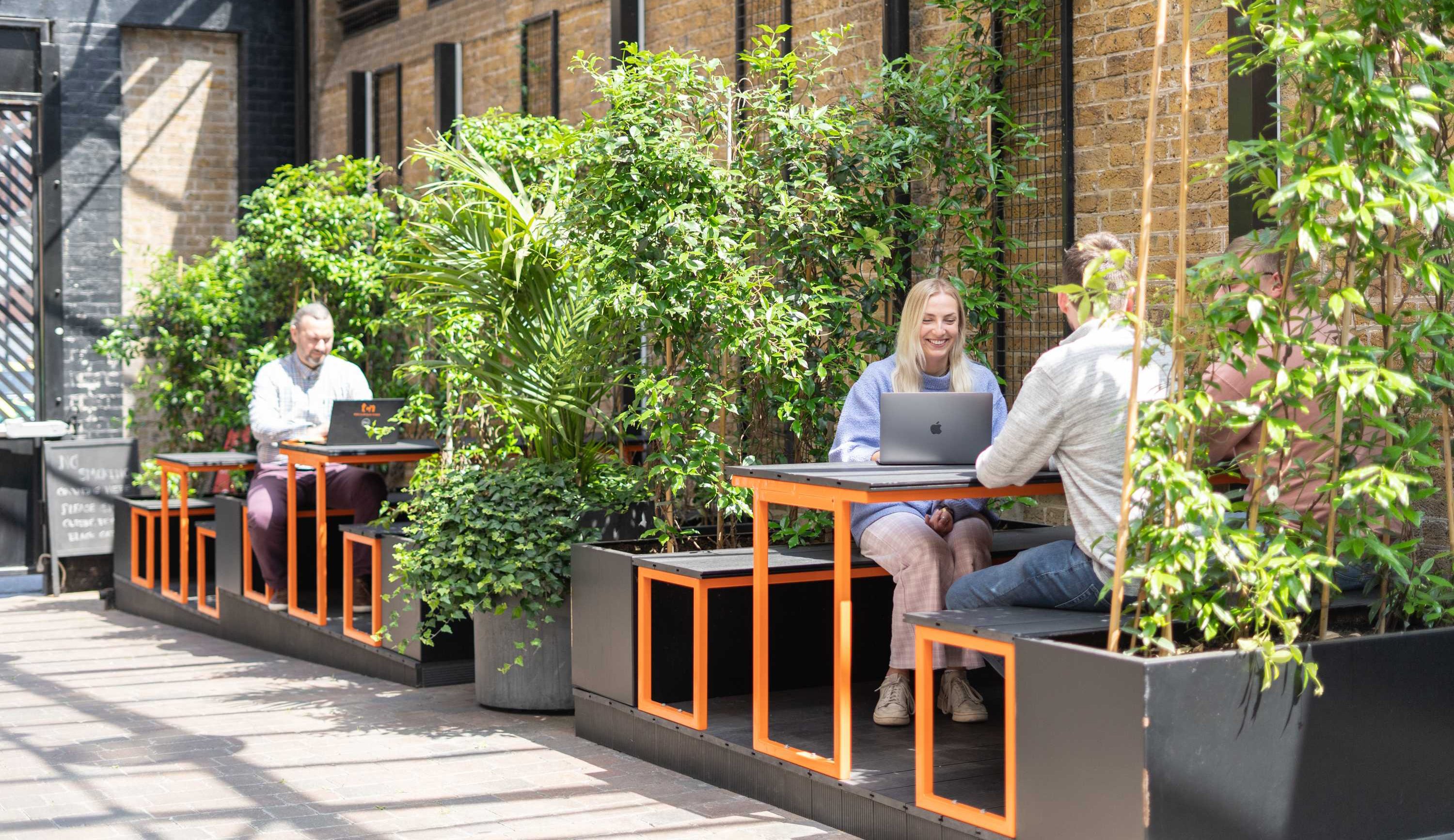 Piano House, in Brixton, Atrium with people working